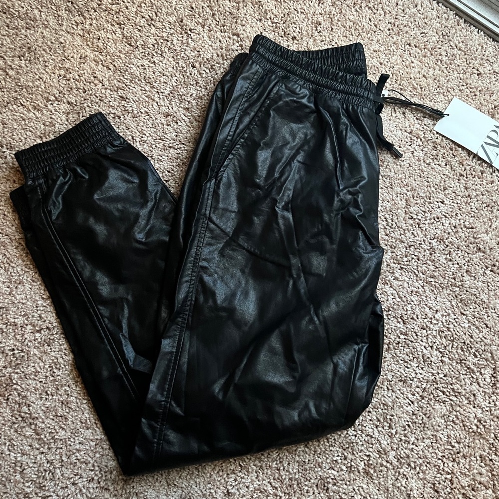 Faux leather joggers.